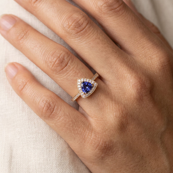 0.97 ct Trillion-Cut Tanzanite and Diamond Halo Cocktail Ring in 14K Yellow Gold, worn