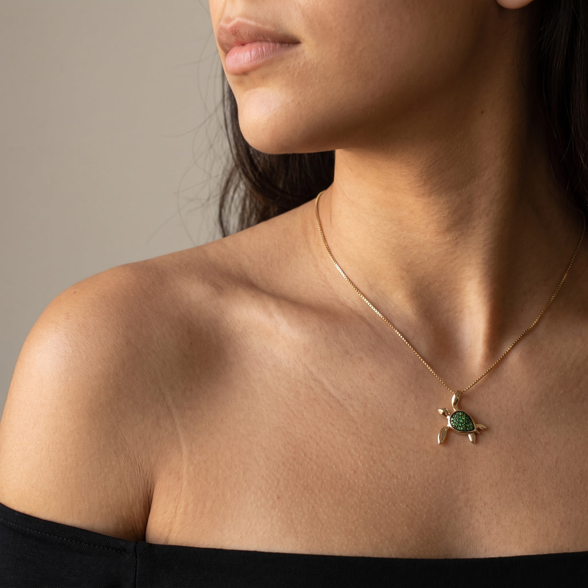 Tsavorite Turtle Charm Necklace in Yellow Gold, worn, second view