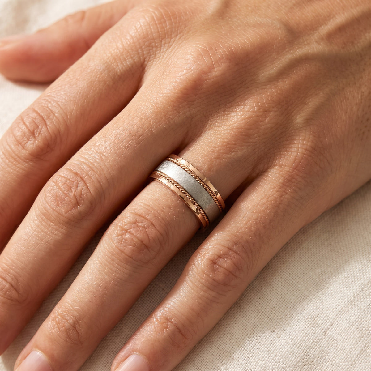 Two-Tone Band Ring with Rope Detailing in 14K Rose and White Gold, worn