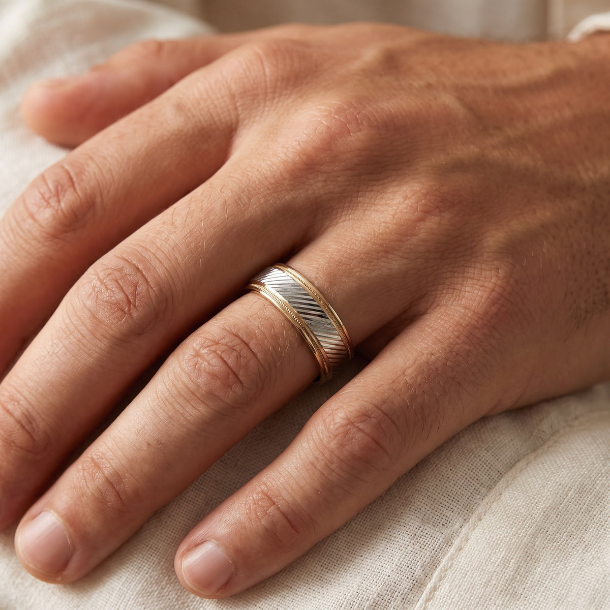 Two-Tone Diagonal Textured Band Ring in Yellow Gold, worn