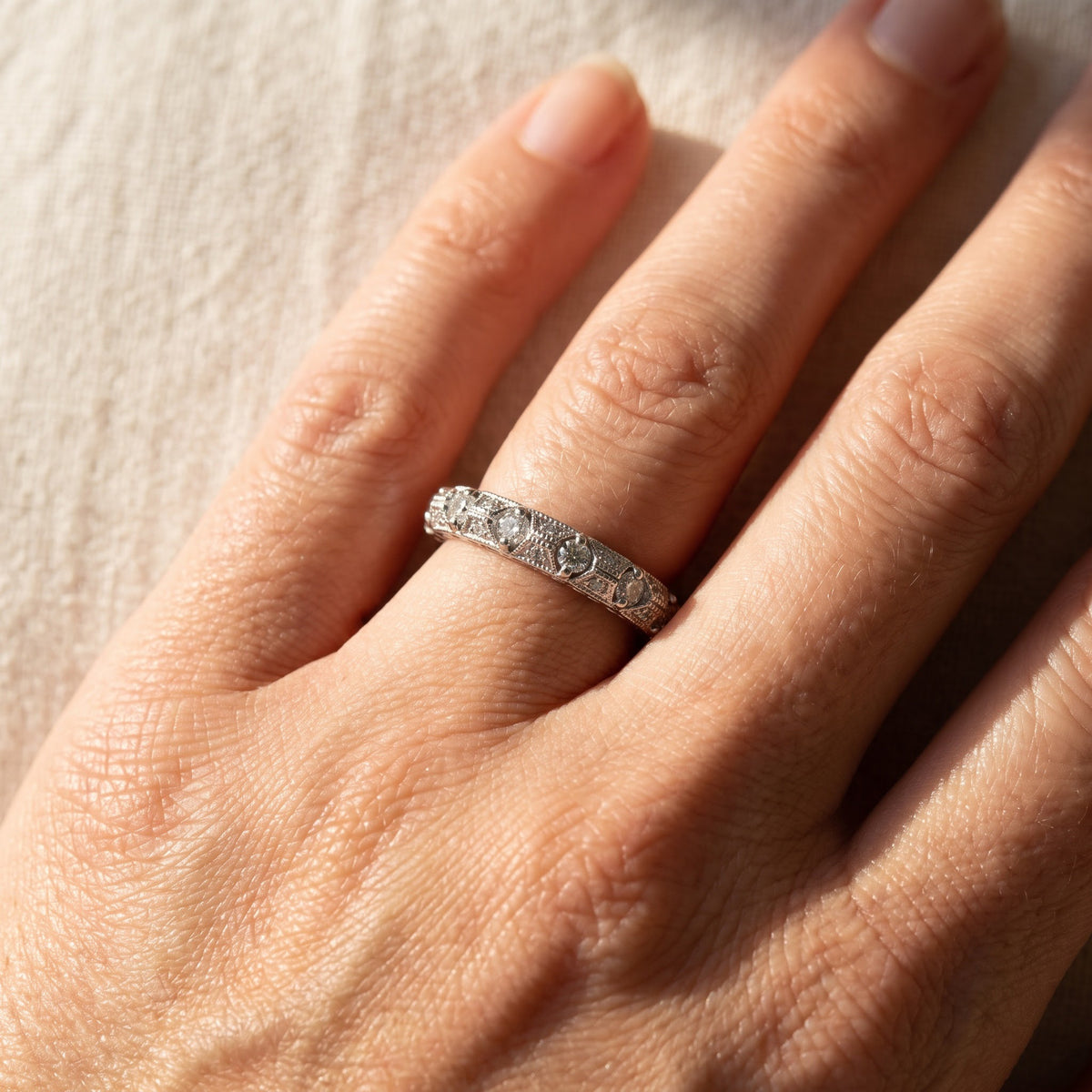 Vintage-Inspired Diamond Eternity Ring in White Gold, worn