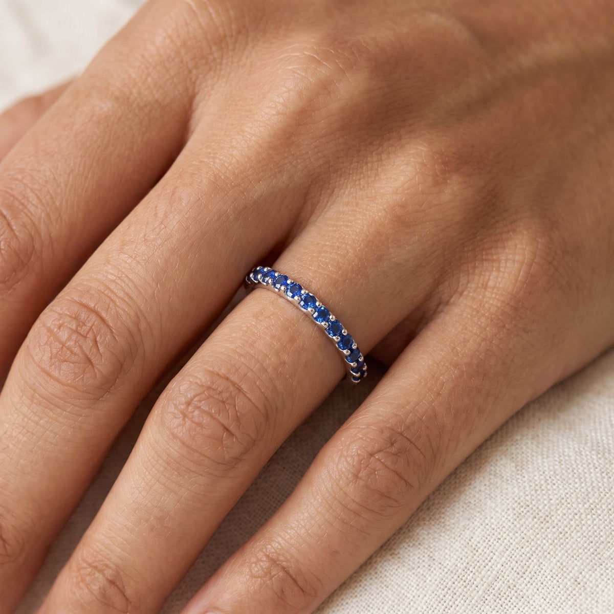 Vivid Blue Sapphire Band in White Gold, worn