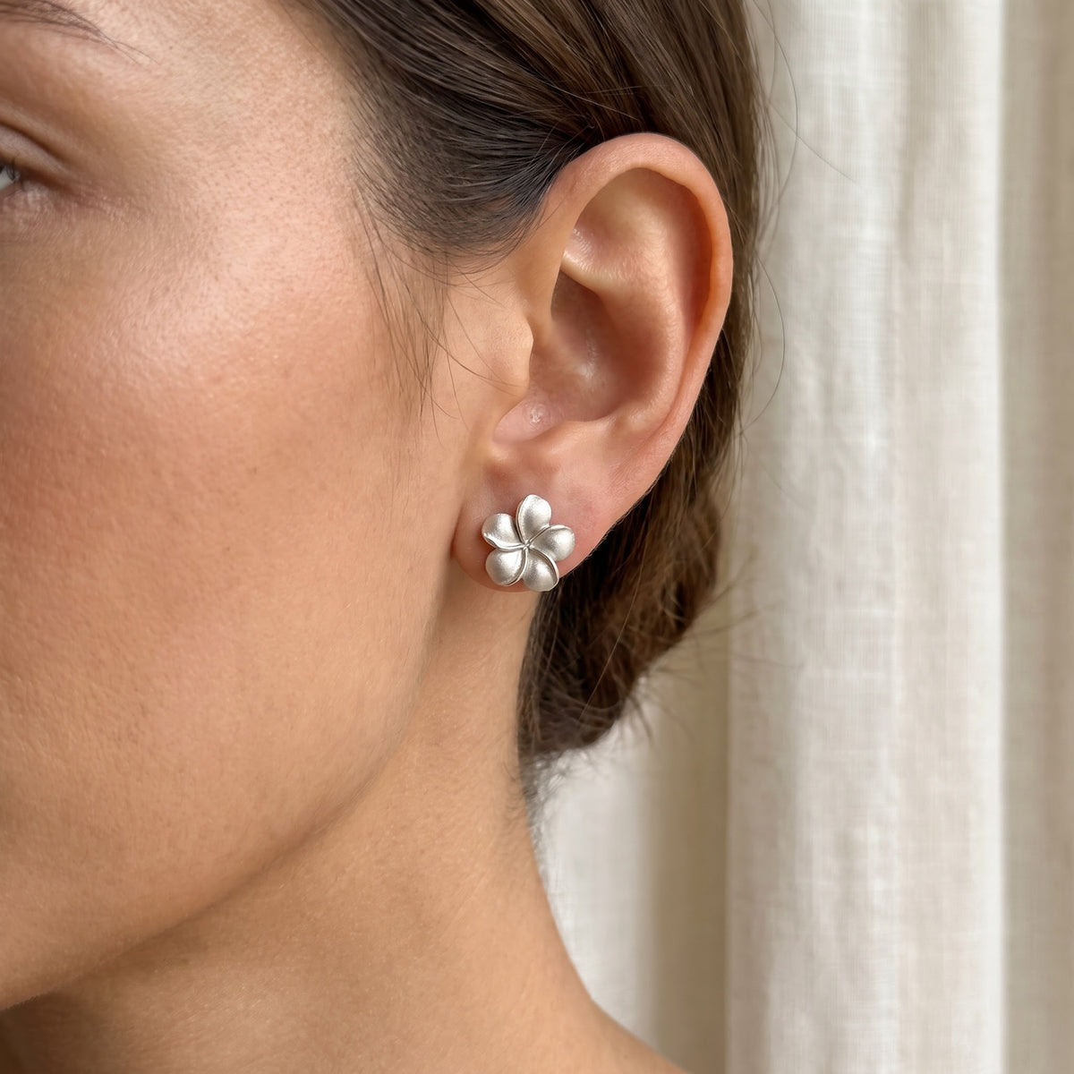 White Gold Plumeria Floral Stud Earrings, worn