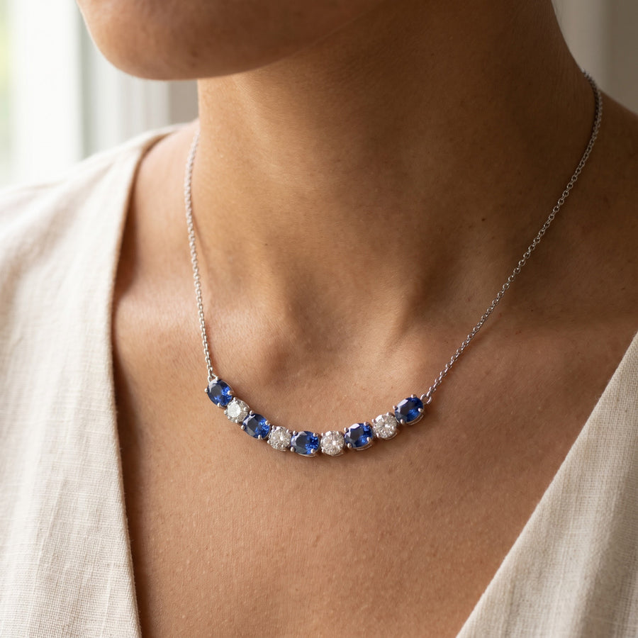 White Gold Royal Blue Sapphire and Diamond Bar Necklace, worn