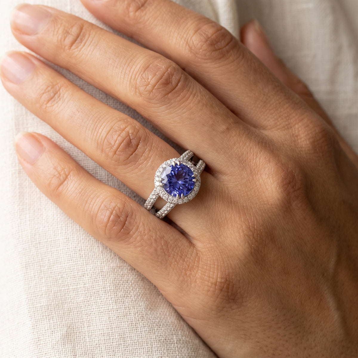 White Gold Tanzanite Cocktail Ring with Split Shank Halo, worn
