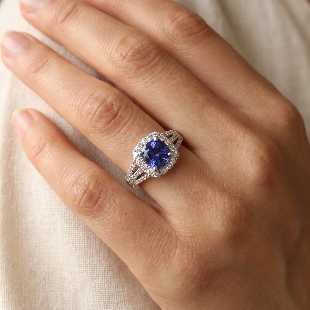 White Gold Tanzanite Halo Ring with Split Shank, worn