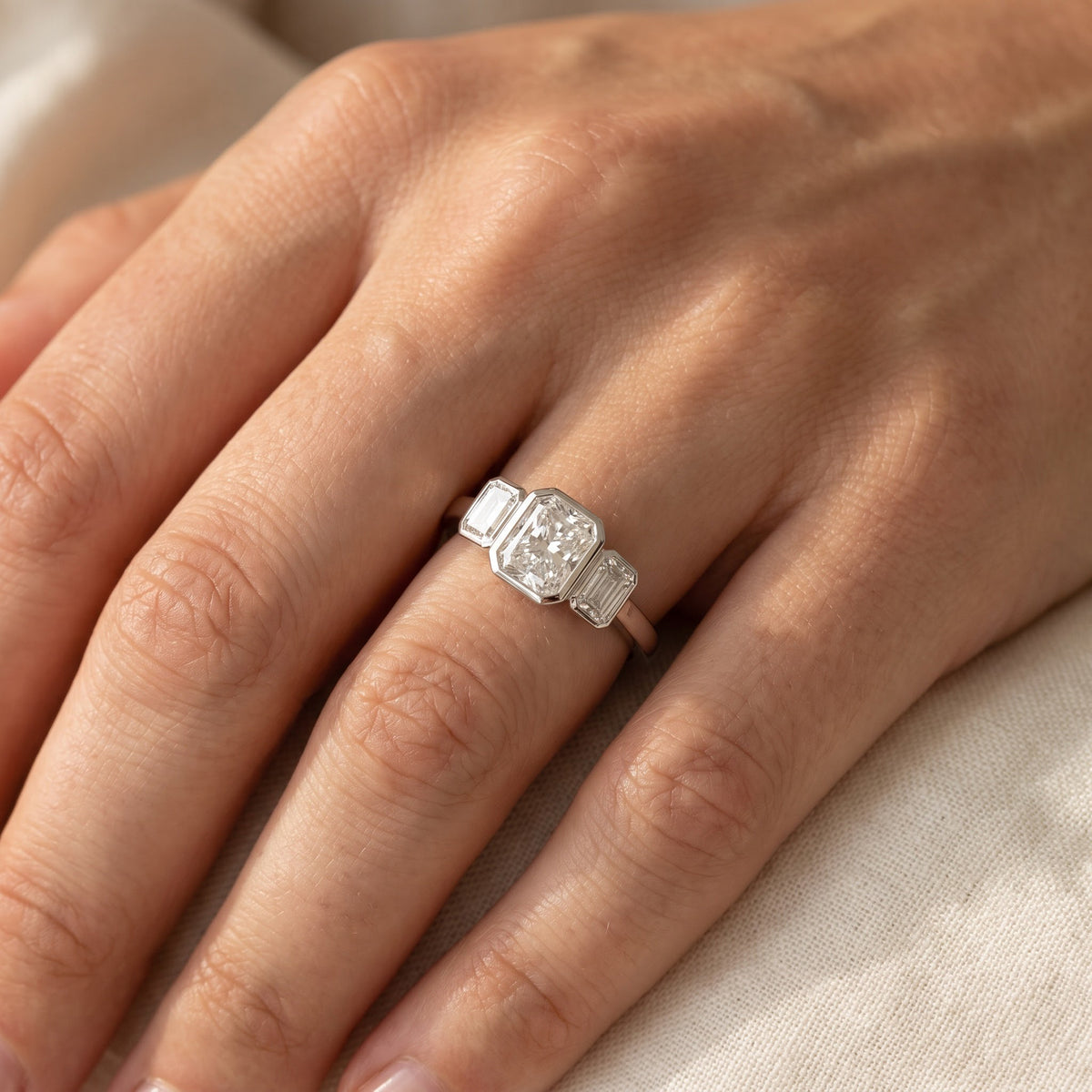 White Gold Three-Stone Bezel Diamond Ring, worn