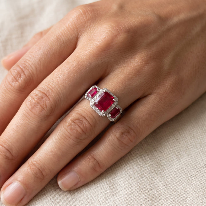 2.28 ct Three-Stone Ruby and Diamond Halo Ring in 14K White Gold, worn
