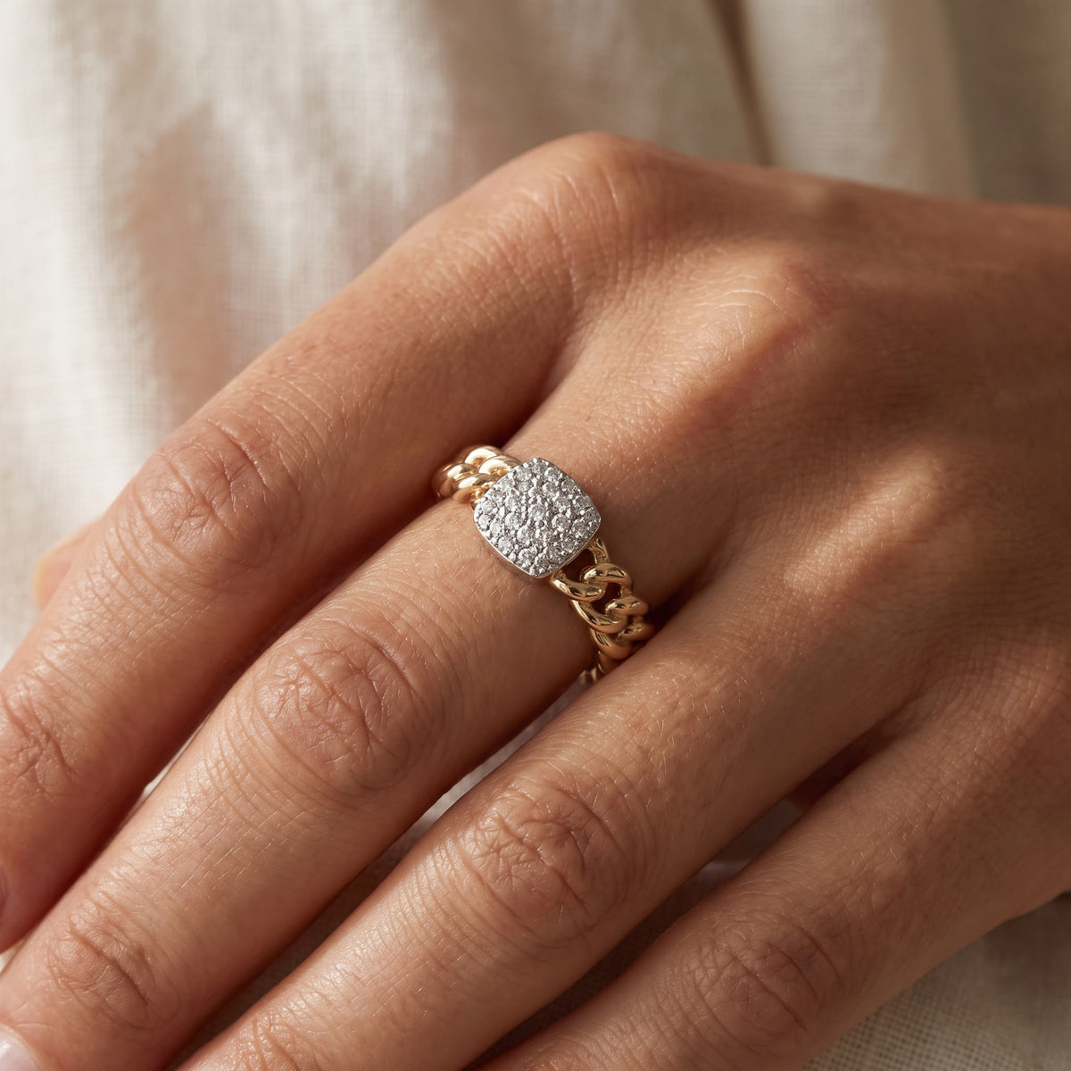 Yellow and White Gold Chain Link Ring with Diamond Cluster Center, worn