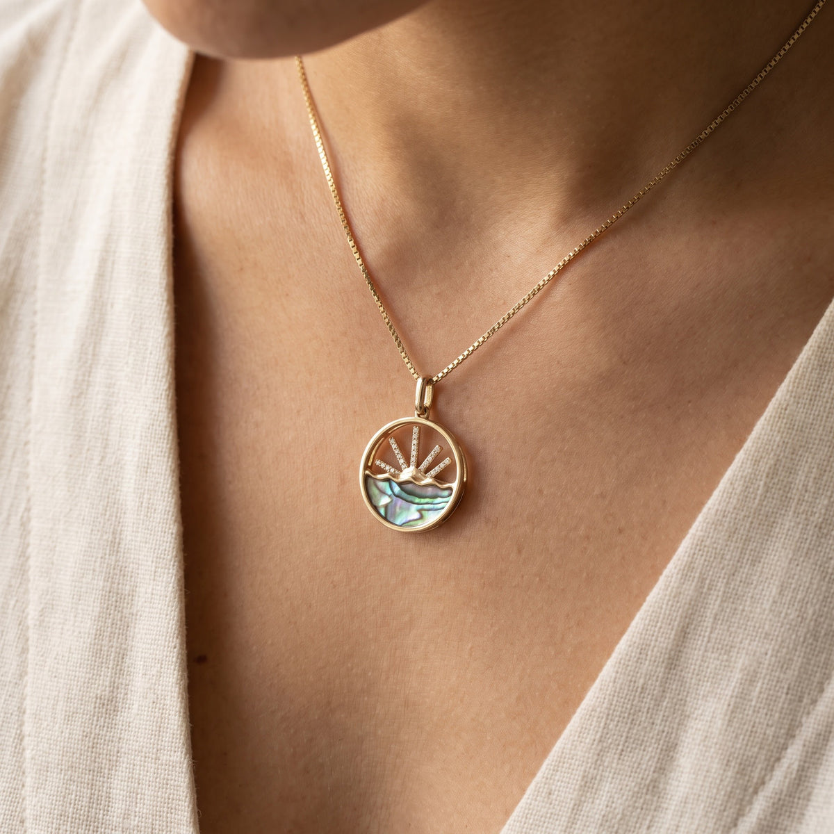 Yellow Gold Abalone Sunset Motif Charm Necklace, worn
