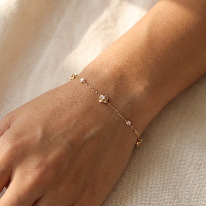 0.07 ct Diamond Floral Station Chain Bracelet in 14K Yellow Gold, worn