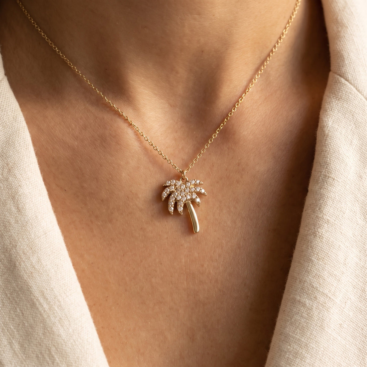Yellow Gold Diamond Palm Tree Charm Necklace, worn