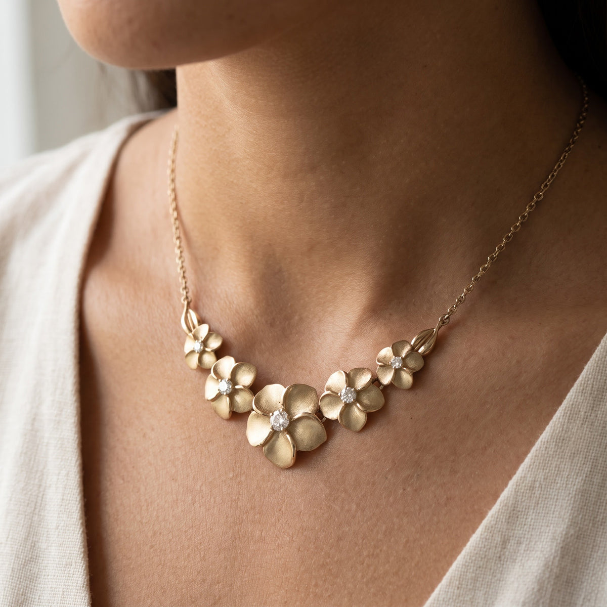 Five-Flower Yellow Gold Diamond Plumeria Necklace, worn