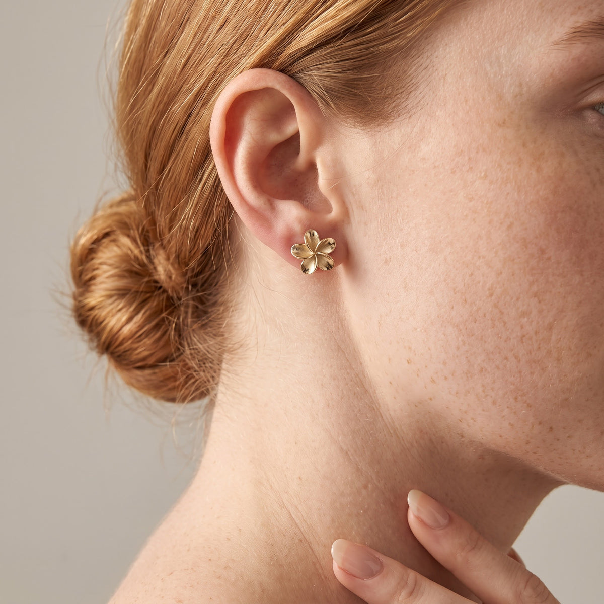 Yellow Gold Floral Stud Earrings, worn, second view