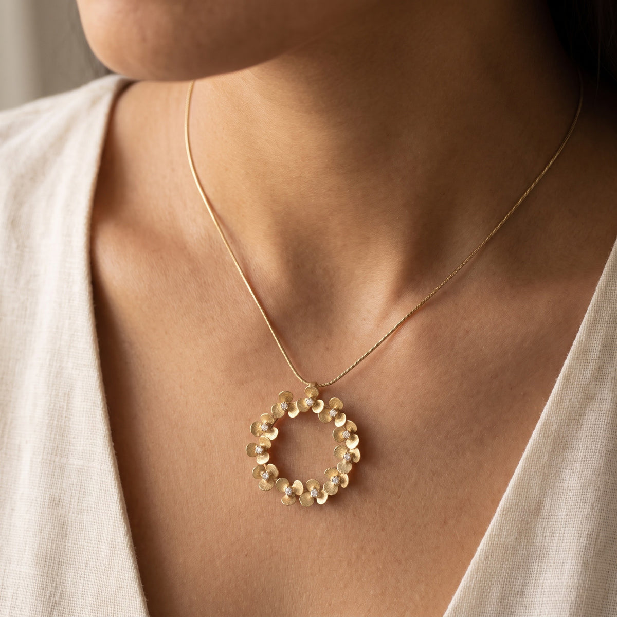 Yellow Gold Floral Wreath Diamond Pendant Necklace, worn