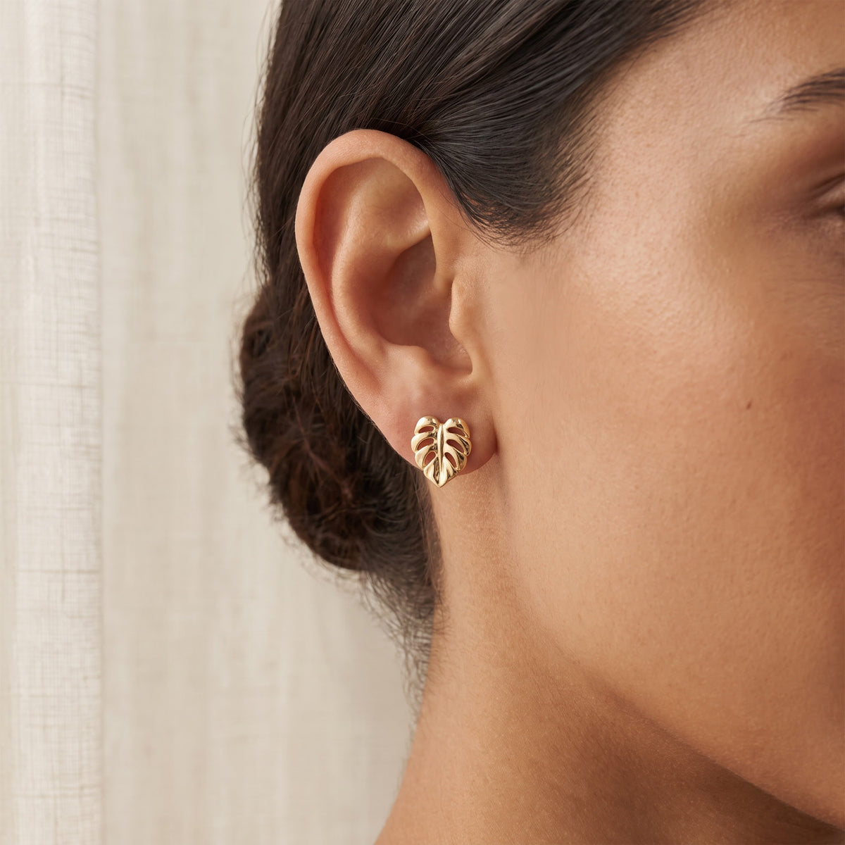 Yellow Gold Monstera Leaf Stud Earrings, worn
