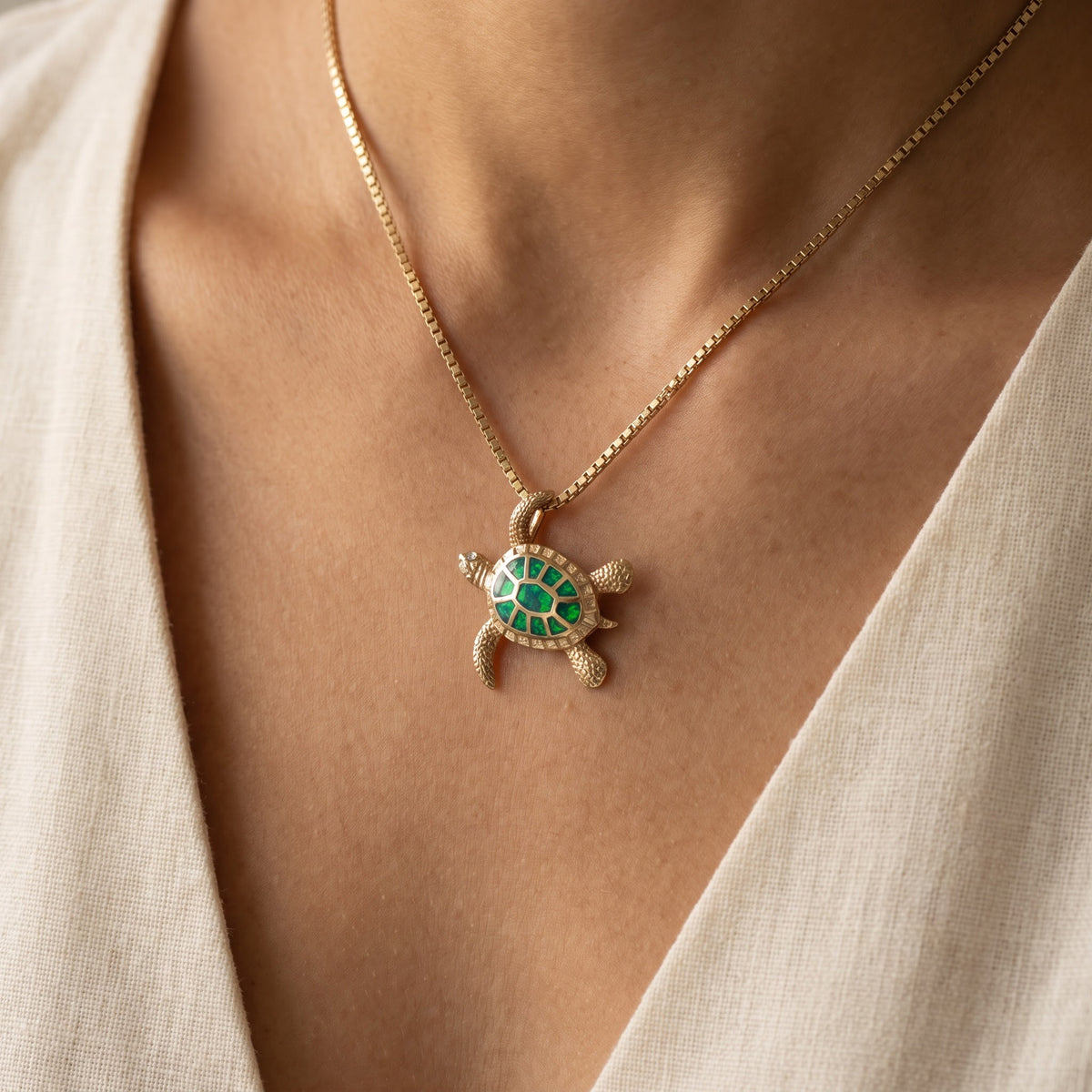 Yellow Gold Opal Inlay Sea Turtle Pendant, worn