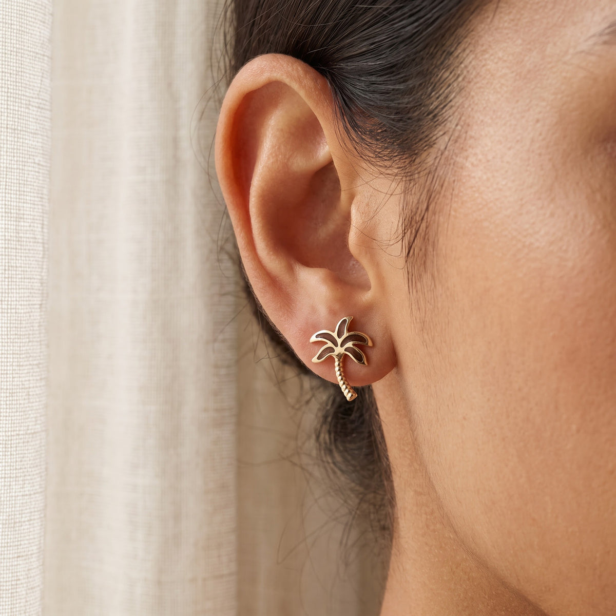 Yellow Gold Palm Tree Stud Earrings, worn