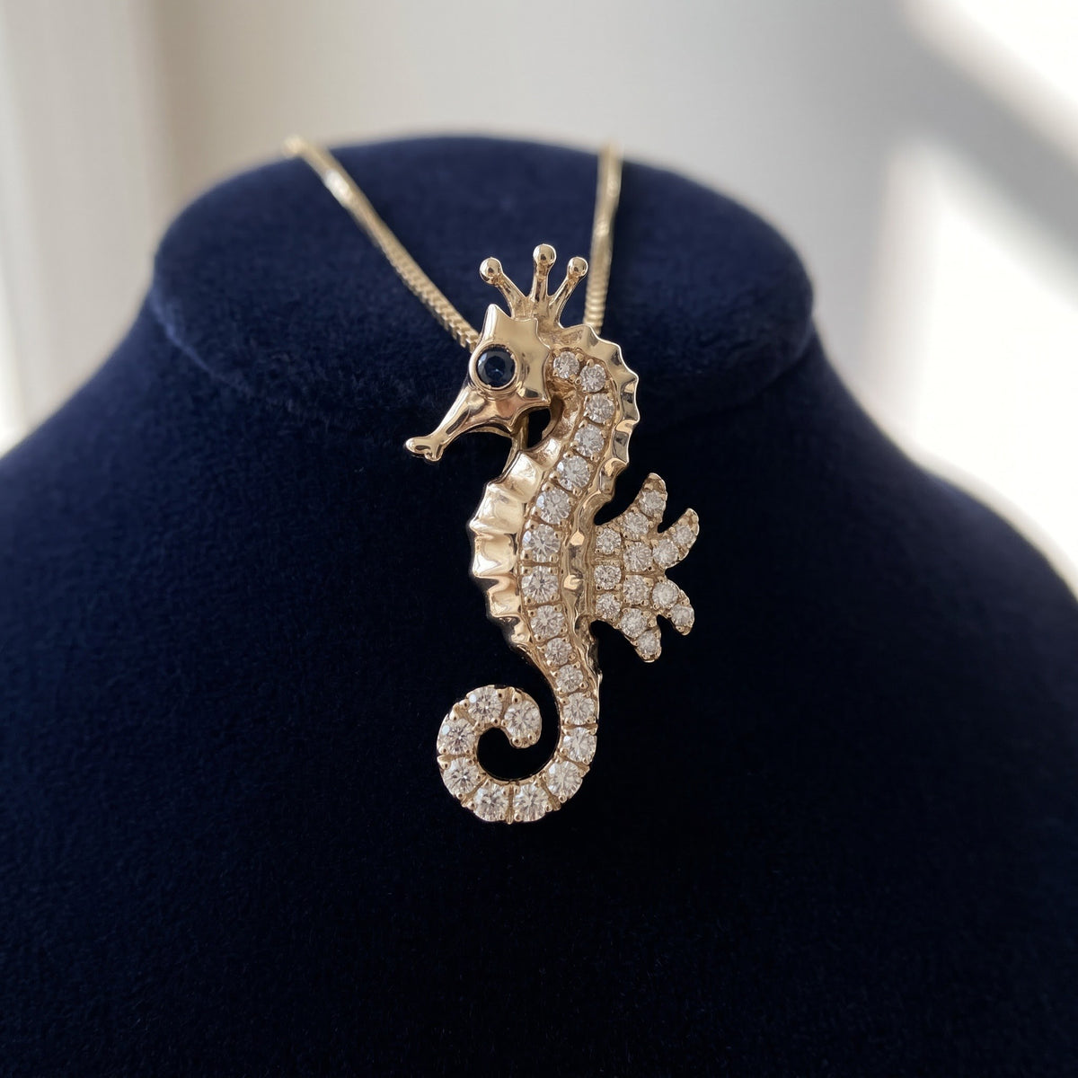 0.42 ct Diamond Seahorse Pendant with Blue Sapphire Eye in 14K Yellow Gold