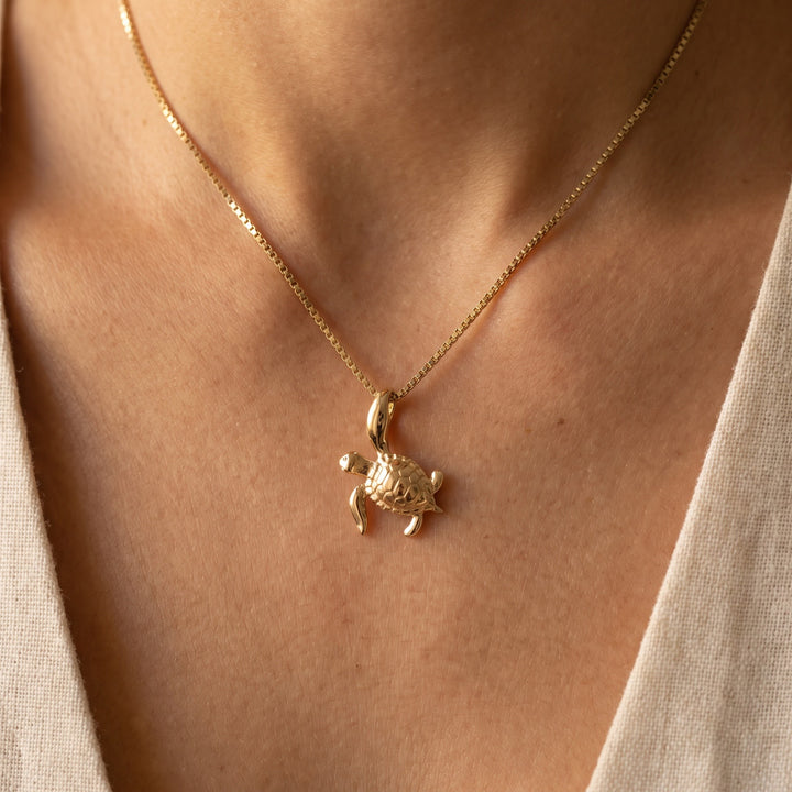 Sea Turtle Charm Necklace in 14K Yellow Gold, worn