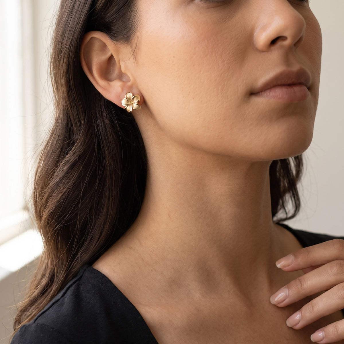 Yellow Gold Textured Plumeria Stud Earrings, worn, second view