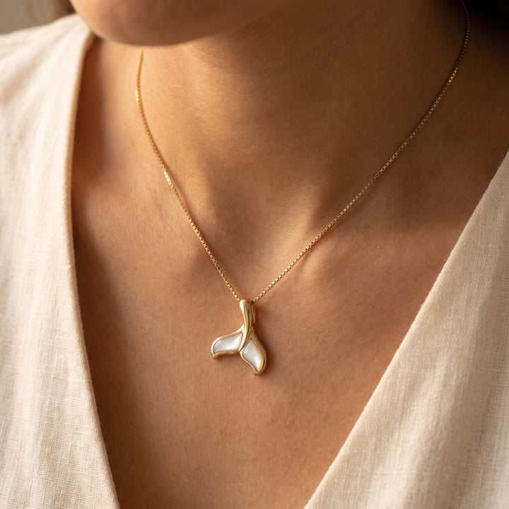 Mother of Pearl Inlay Whale Tail Charm Necklace in 14K Yellow Gold, worn