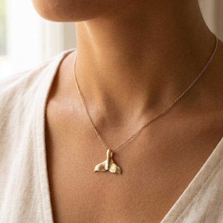 Whale Tail Charm Necklace in 14K Yellow Gold, worn